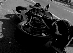 Motorcycle lying on street